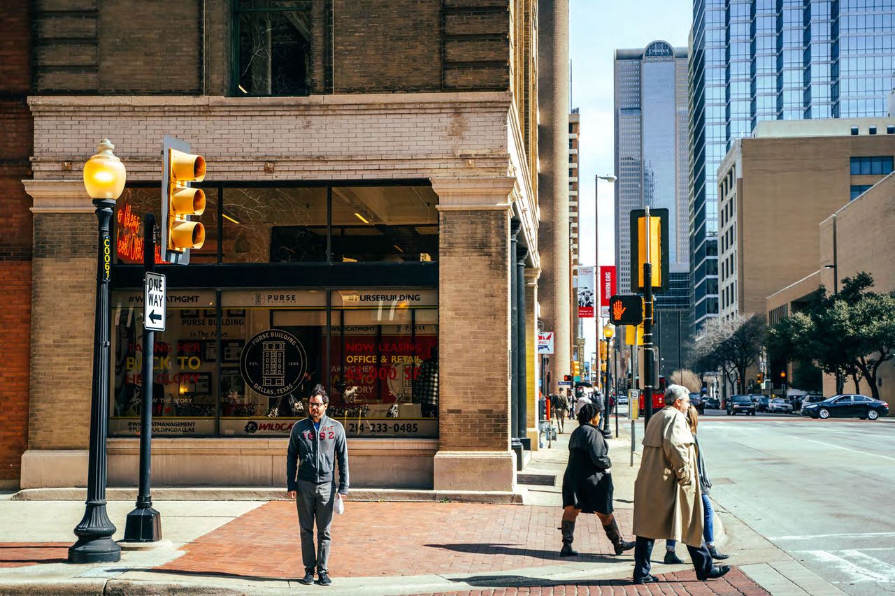 busy dallas corner on elm street by purse building crosswalk